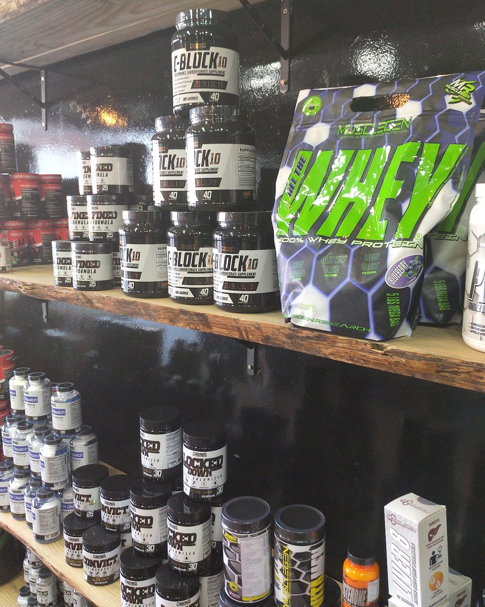 Shelves of protein and supplement products inside the Protein Planet store in Sharjah